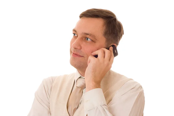 Homme parlant au téléphone sur un blanc — Photo
