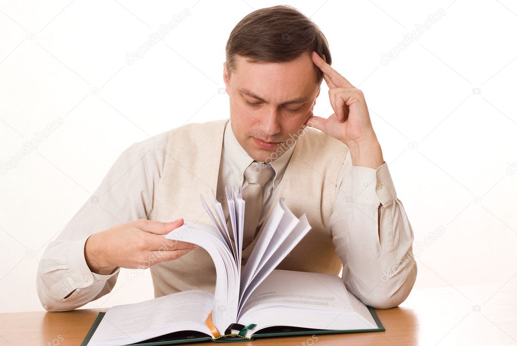 Businessman reading a book