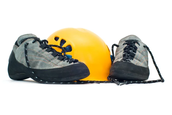 Climbing helmet and shoes — Stock Photo, Image