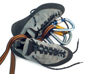 Carabiners and climbing shoes clipart