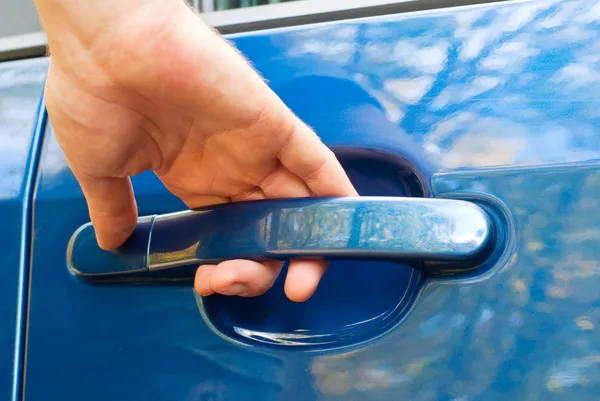 stock image Hand opening car door