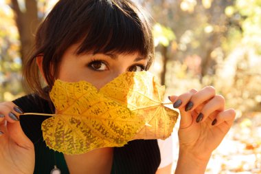 Girl and leaves clipart