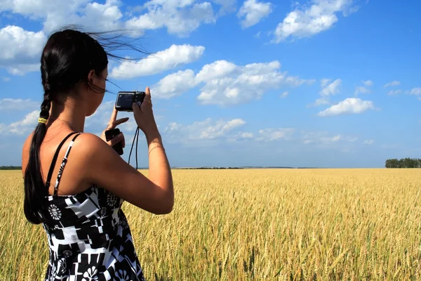 stock image Girl photographes the nature