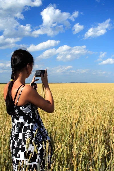 stock image Girl photographes the nature