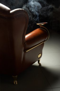 Cigar and armchair clipart