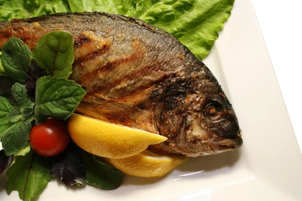 Grill a fish — Stock Photo, Image
