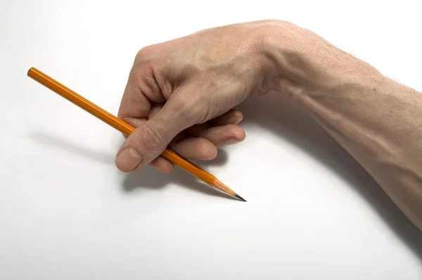 拿一支铅笔的手 — 图库照片