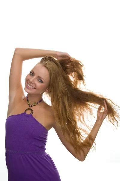 Ragazza con i capelli rossi su uno sfondo bianco — Foto Stock