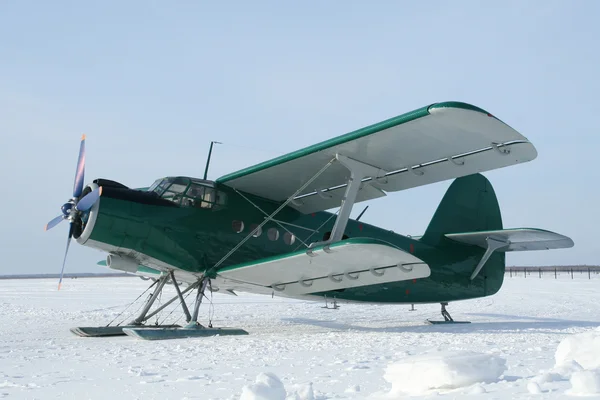 stock image Plane with skis on the snow