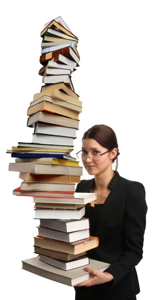Mädchen mit einem sehr großen Stapel Bücher — Stockfoto
