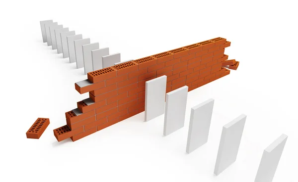 Brick wall cross a line of dominoes falling — Stock Photo, Image