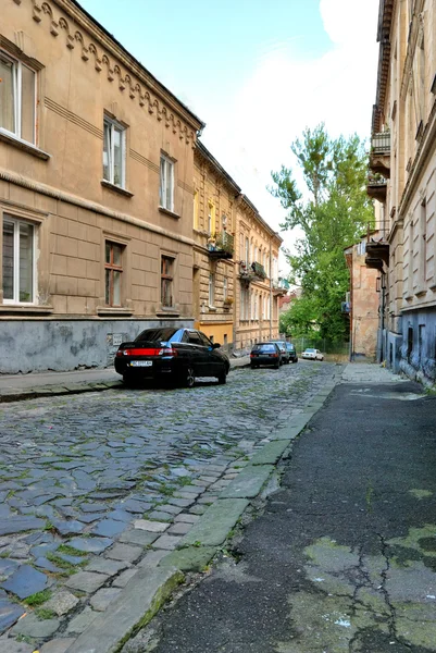 Estrada-pedra colocada em uma cidade europeia velha — Fotografia de Stock