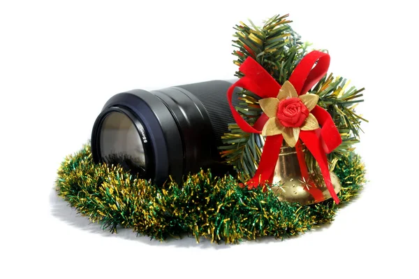 Lens and Christmas toy — Stock Photo, Image