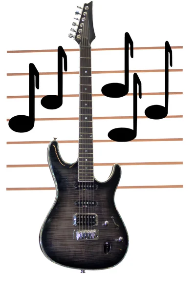 Elektrická kytara a noty. — Stock fotografie