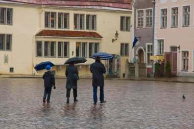 with umbrellas in Tallinn clipart