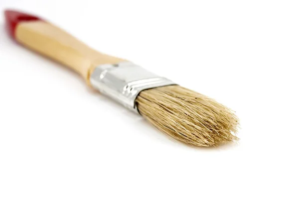 Paint brush with wooden hand — Stock Photo, Image
