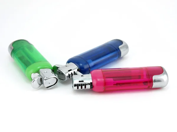 Composition from three plastic lighters — Stock Photo, Image