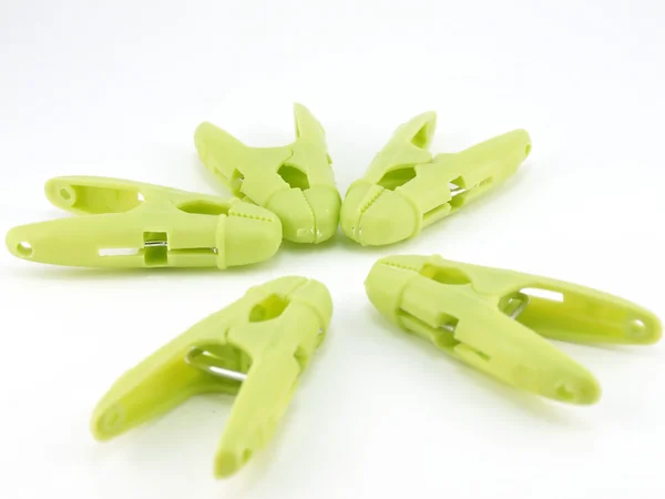 Green clothes-pegs — Stock Photo, Image
