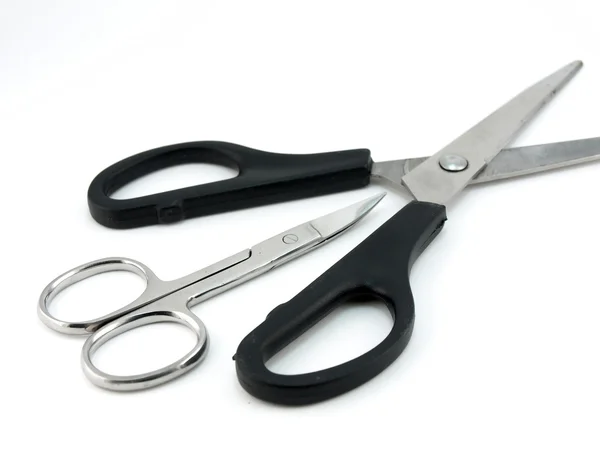 Velké a malé manikúry nůžky — Stock fotografie
