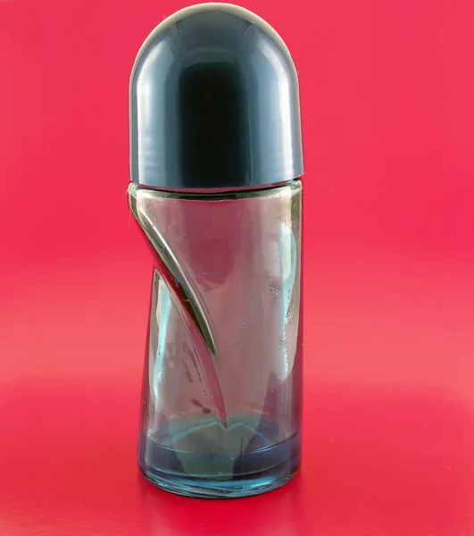 Szkło dla dezodorant na różowym tle — Zdjęcie stockowe