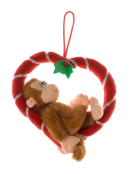 Monkey on a heart — Stock Photo, Image