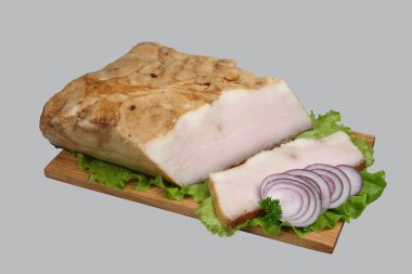 Lard on wooden board. clipart