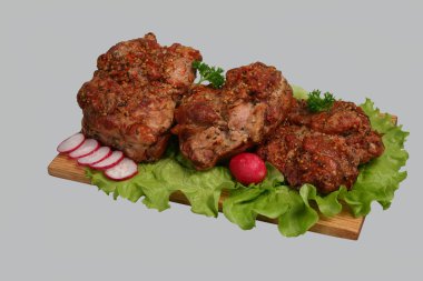 Smoked chicken kebab on wooden board. clipart