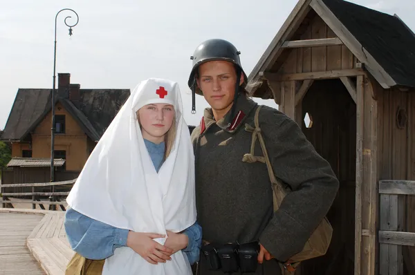 Retro kép nővér és katona — Stock Fotó