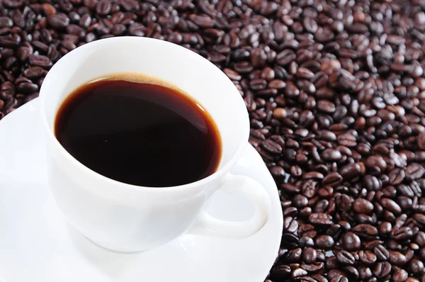 Black coffee in a white cup — Stock Photo, Image