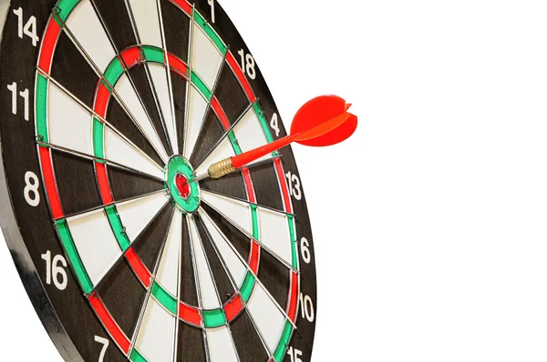 Pilen dart i en center ett mål på whit — Stockfoto