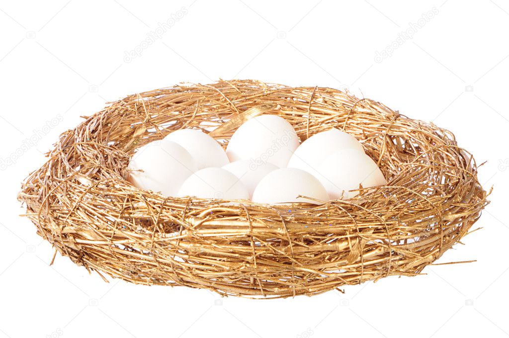 White eggs in golden nest
