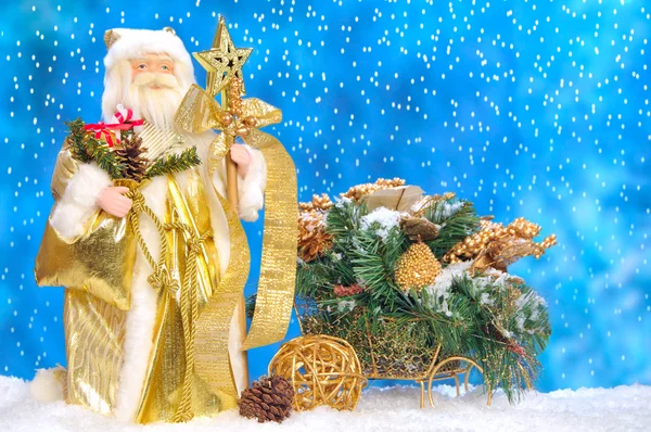 Игрушечный Санта Клаус и его сани — стоковое фото