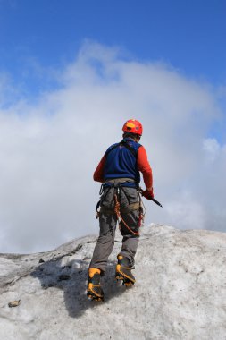 Climber on a glacier clipart