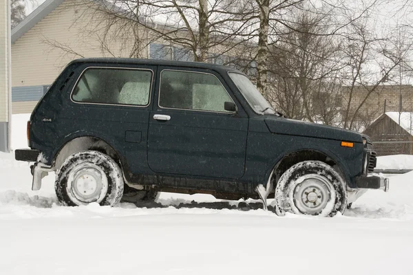4x4 russian jeep in snow. — Stock Photo, Image