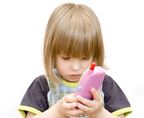 Дитина з іграшковим телефоном — стокове фото