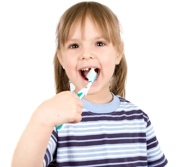 Dívka si čistí zuby Stock Snímky