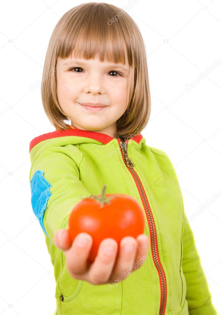 Little girl with tomatoes