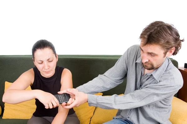 Couple swears because of remote control — Stock Photo, Image
