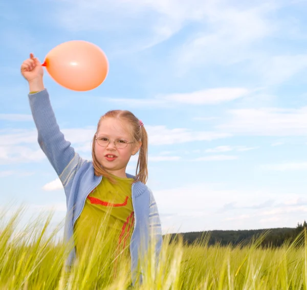 Chica con un globo — Foto de Stock