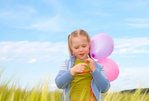 Menina com um balão — Fotografia de Stock