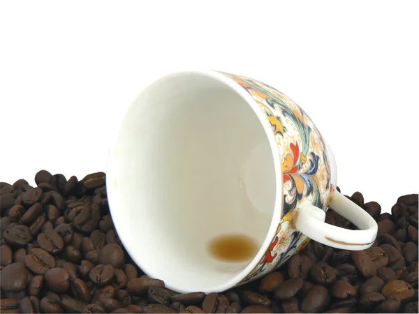 空のカップとコーヒーの粒 — ストック写真