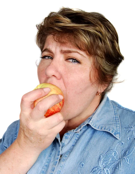 Woman bite apple — Stock Photo, Image