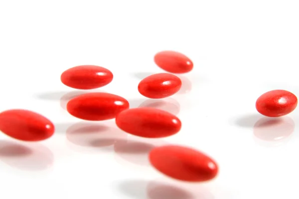 stock image A few medicine tablets on a table