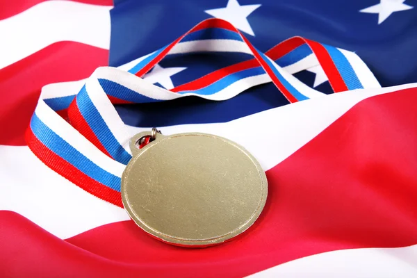 stock image Gold medal with ribbon and usa flag