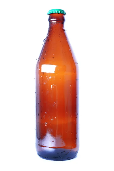 Brown bottle with cap isolated on white — стокове фото