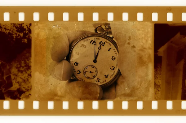 Old 35mm frame photo with vintage clock — Stock Photo, Image