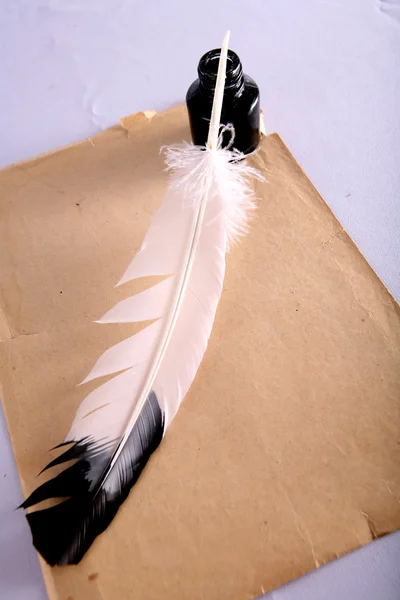 Vintage paper with ink feather — Stock Photo, Image