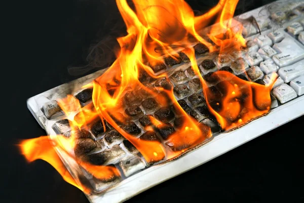 Burning computer keyboard — Stock Photo, Image