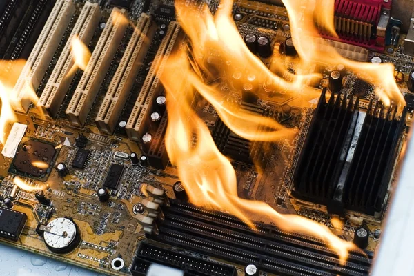 Burning computer board — Stock Photo, Image