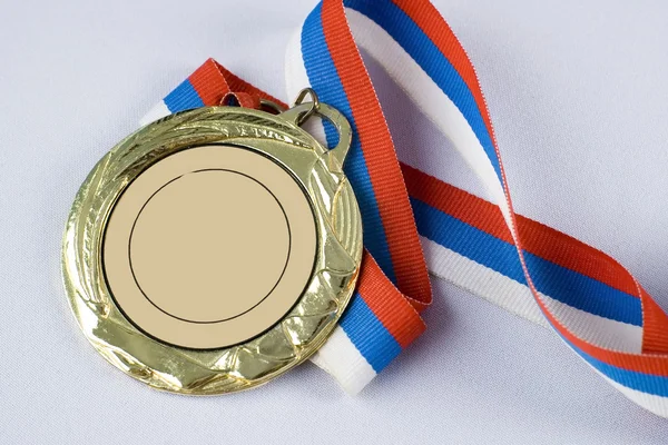 Gold medal with ribbon — Stock Photo, Image